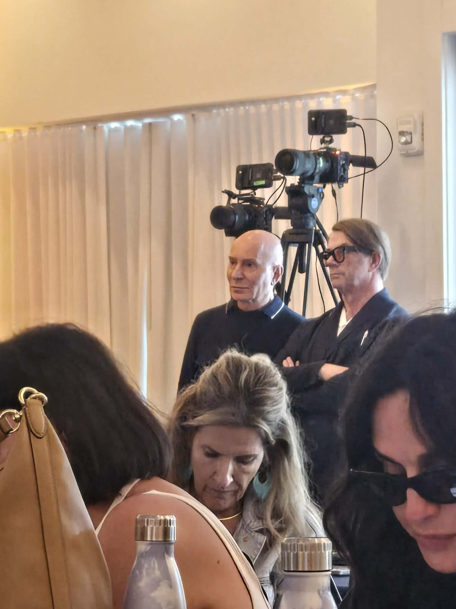 haircut demonstration by professional stylist at R+Co event – hair salon Chesapeake