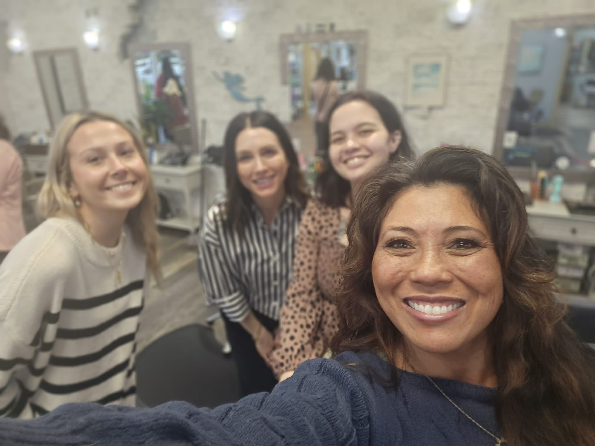 Behind the chair at Coastal Roots Salon