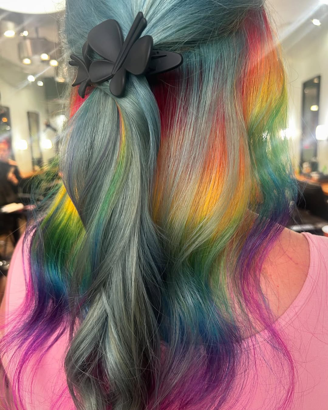 Rainbow fashion hair color at Coastal Roots Hair Salon