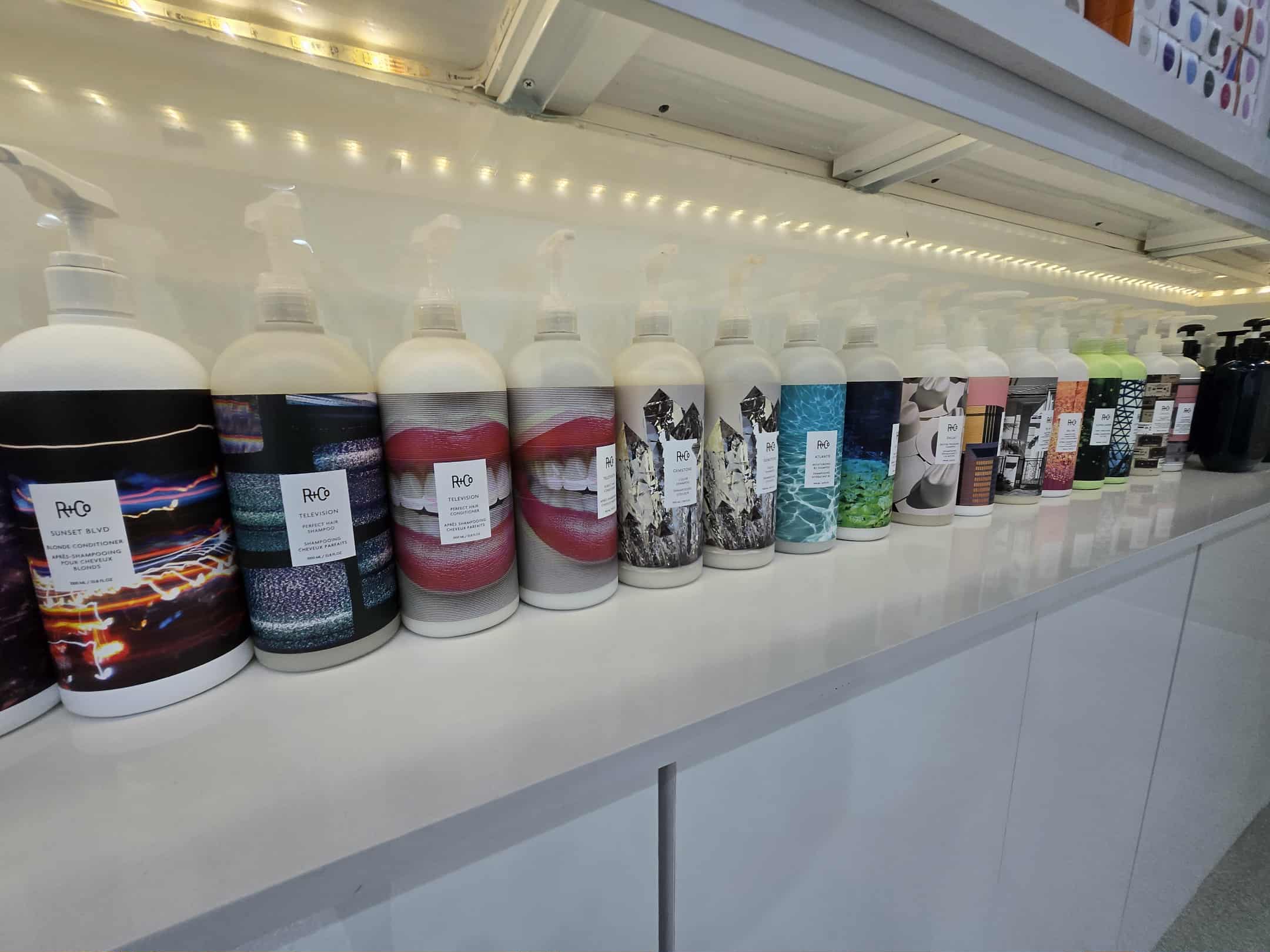 Professional salon products and detail display at Coastal Roots Salon